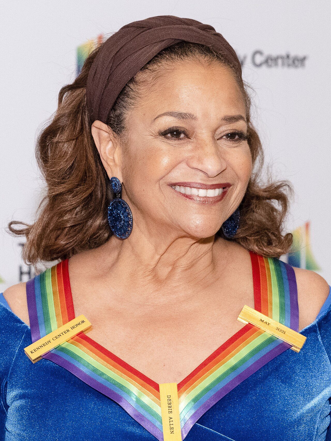 Debbie Allen smiling at the Kennedy Center Honors medallion ceremony at the Library of Congress in 2021