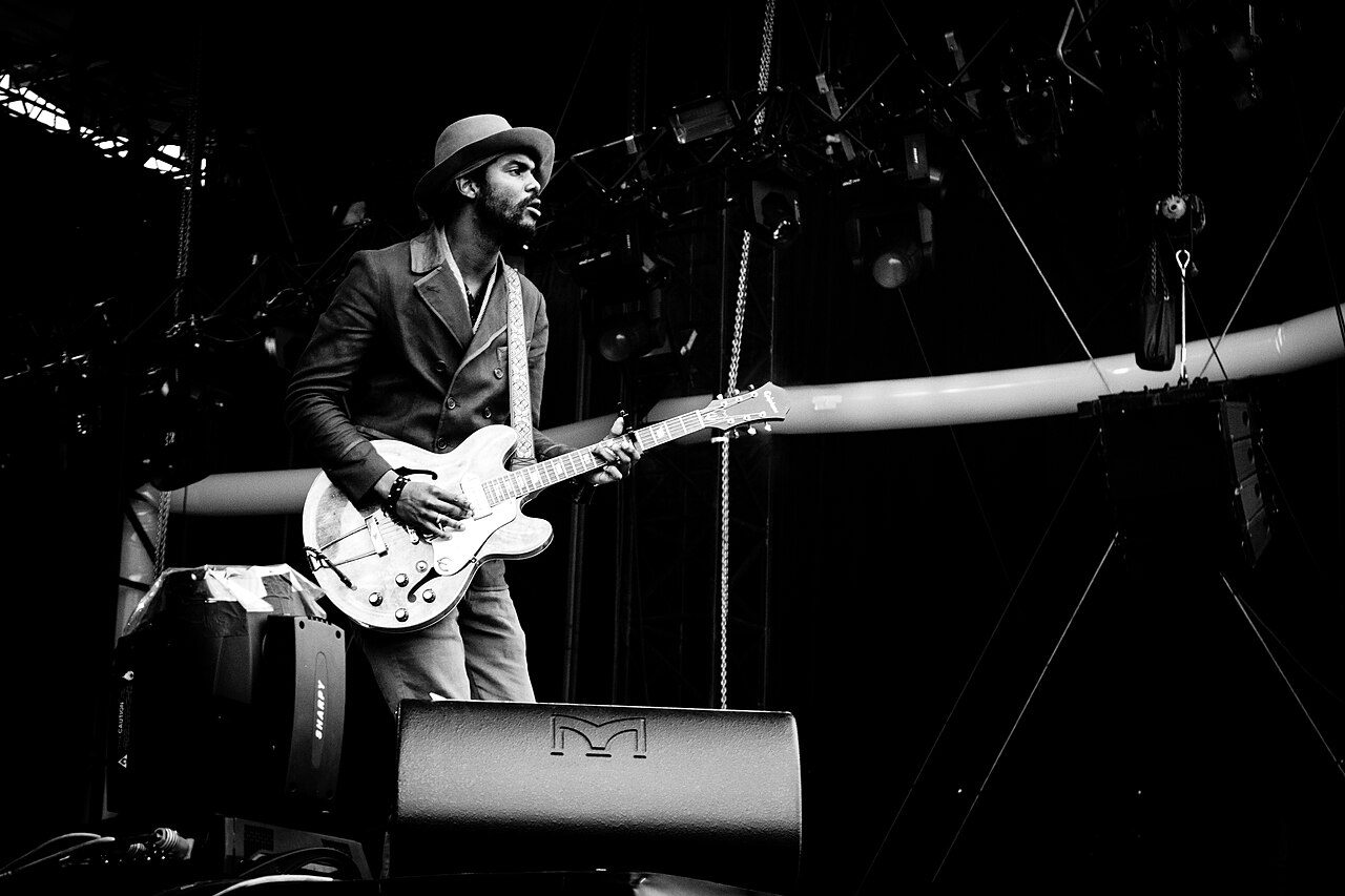 Gary Clark Jr. playing guitar on stage at the Eurockéennes festival in 2013