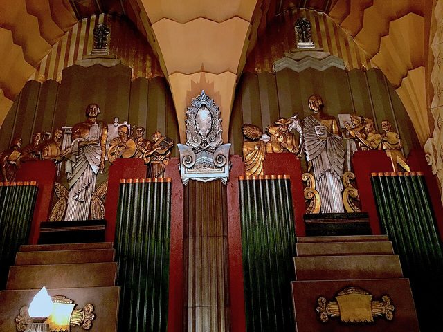 Gilded Art Deco statues inside the Hollywood Pantages Theatre