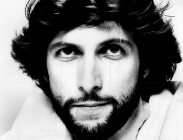 Stephen Bishop in a black and white ABC Records publicity portrait from 1977